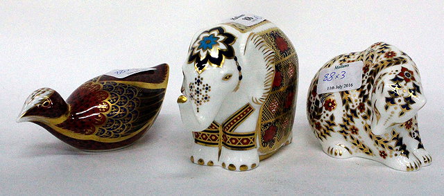 Appraisal: THREE ROYAL CROWN DERBY IMARI PAPERWEIGHTS including an elephant a