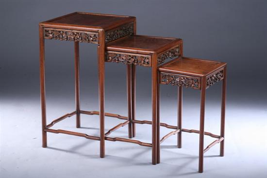 Appraisal: THREE CHINESE HARDWOOD NESTED TABLES th century The square top