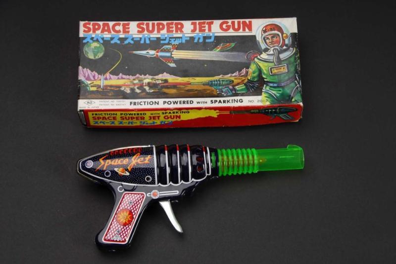 Appraisal: Tin Space Super Jet Gun Toy Description Japanese Made by