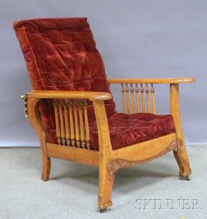 Appraisal: Late Victorian Carved Oak Spindle-sided Morris Chair with upholstered cushions