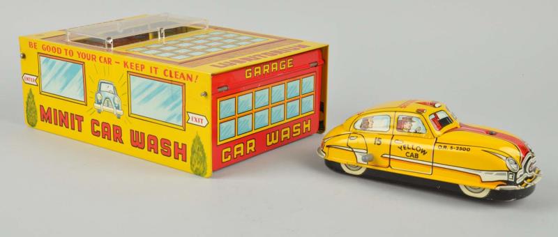 Appraisal: Marx Tin Litho Wind-Up Automatic Car Garage Set Colorful original