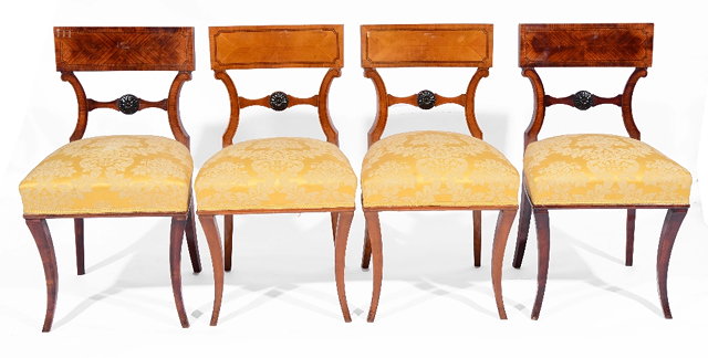 Appraisal: TWO PAIRS OF CONTINENTAL BIEDERMEIER SATINWOOD SIDE CHAIRS with carved