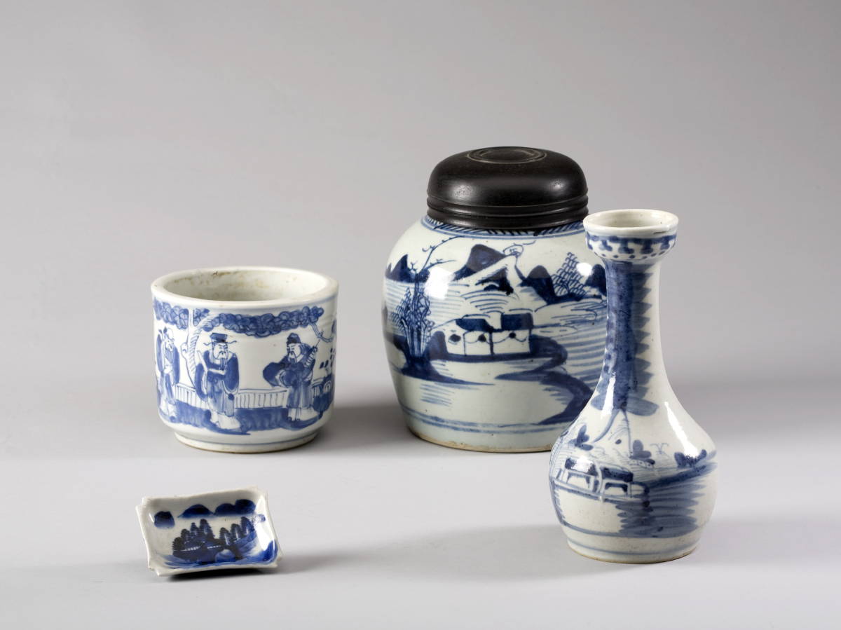 Appraisal: FOUR CHINESE BLUE AND WHITE PORCELAIN WARES Comprising a bottle