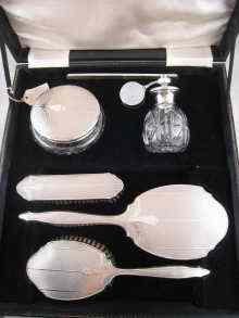 Appraisal: A silver dressing table set complete with powder bowl and