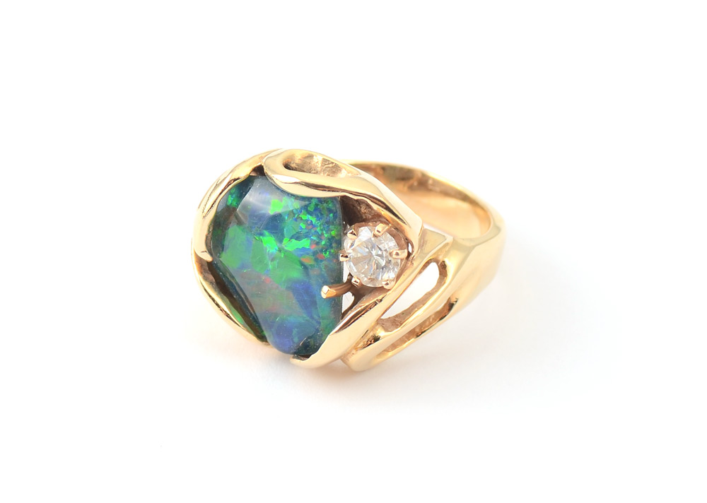 Appraisal: GENTS OR LADIES OPAL TRIPLET AND DIAMOND RING K yellow