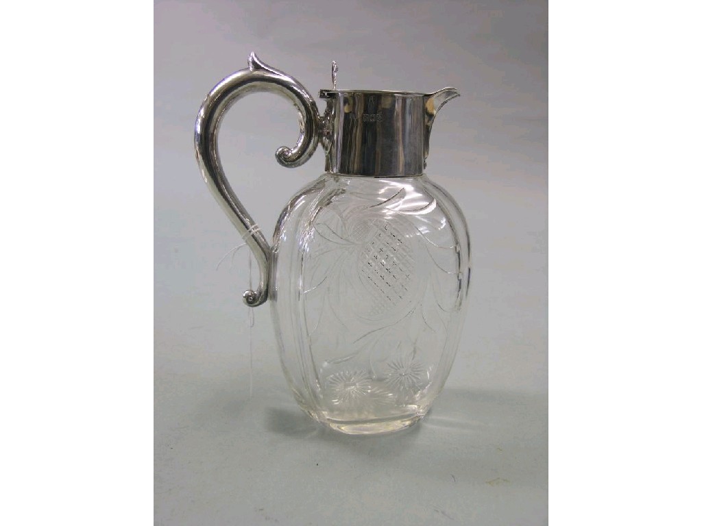 Appraisal: A late Victorian silver mounted glass claret jug bulbous shape