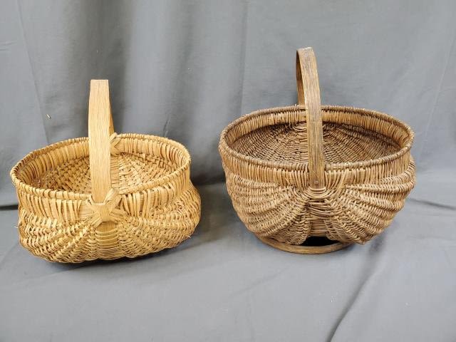 Appraisal: Two antique buttocks baskets Dark one measures x x inches