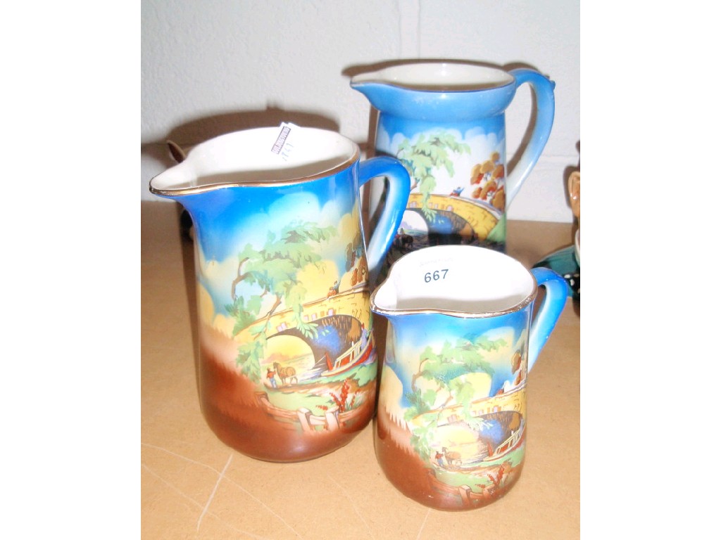 Appraisal: Three Sylvac jugs with canal decoration