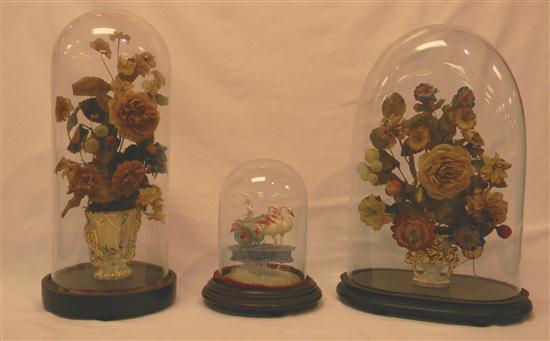 Appraisal: Three Victorian glass domes with wooden bases one with spun