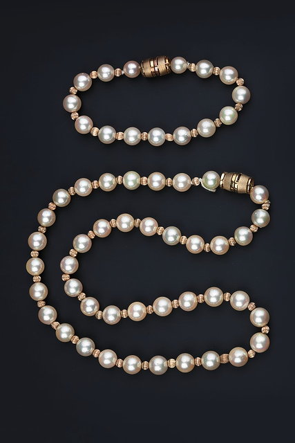 Appraisal: A CULTURED PEARL NECKLACE AND BRACELET SUITE each comprising a