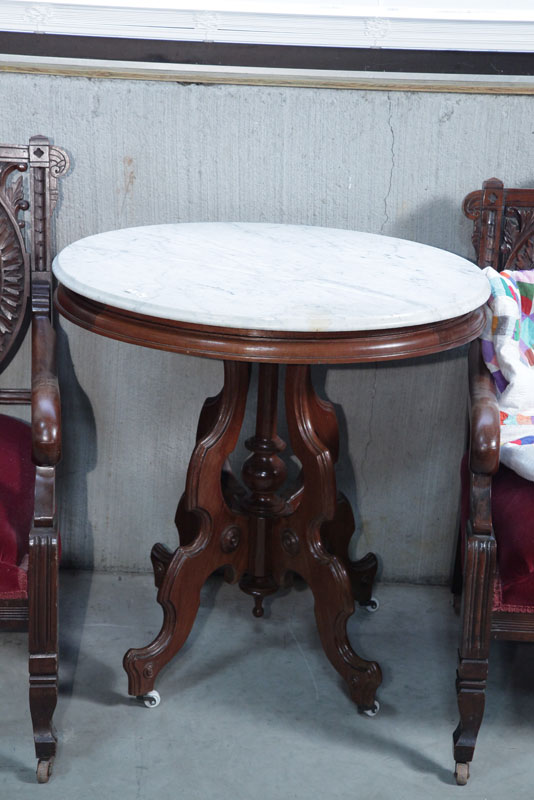 Appraisal: VICTORIAN LAMP TABLE Oval marble top on a conforming walnut