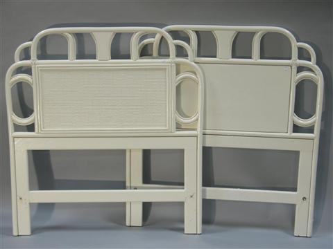 Appraisal: PAIR OF WHITE RATTAN AND CANE HEADBOARDS th century twin-sized