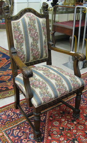 Appraisal: REGENCY STYLE CARVED OAK ARMCHAIR English early th century the