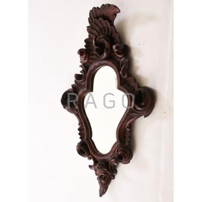 Appraisal: BLACK FOREST MIRROR Carved walnut beveled glass th c x