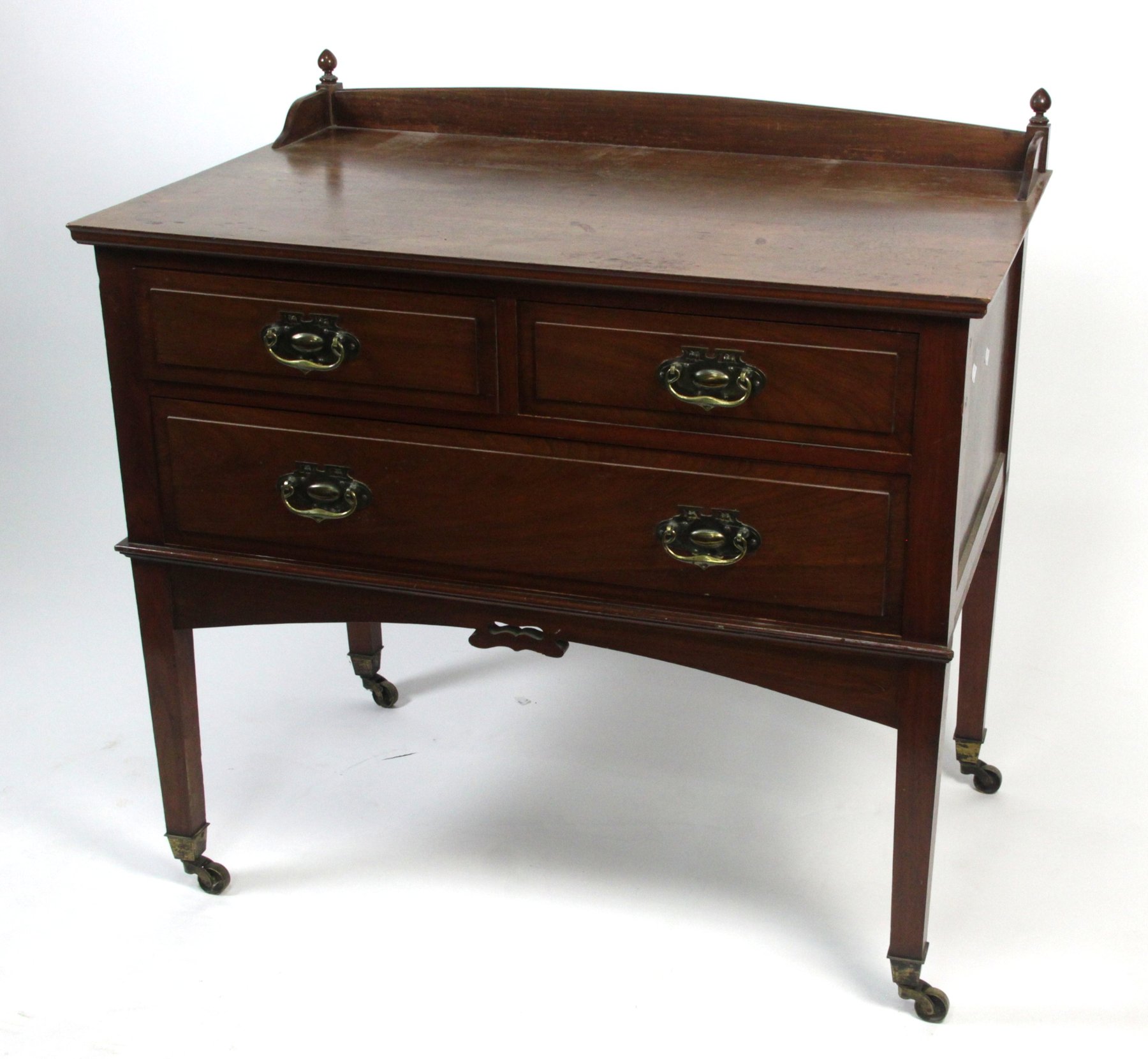 Appraisal: A mahogany washstand circa with two short and one long