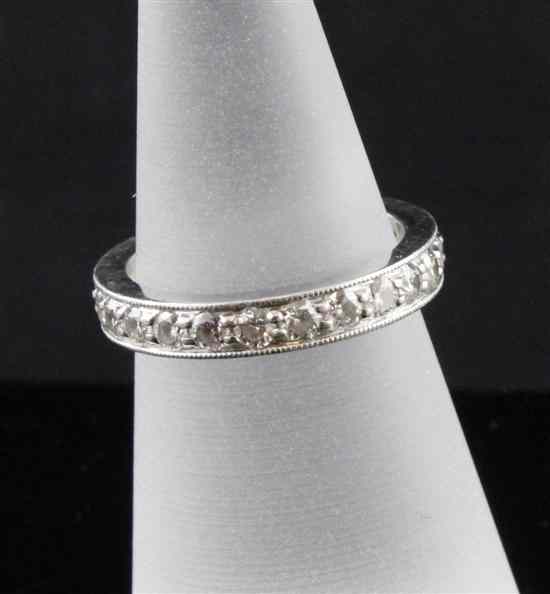 Appraisal: A Tiffany Co platinum and diamond eternity ring set with