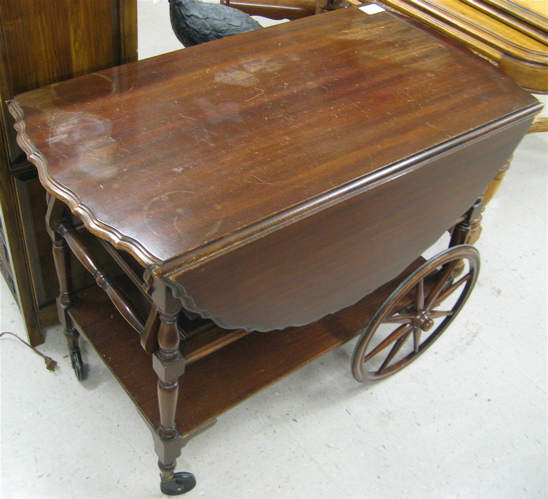 Appraisal: MAHOGANY DROP-LEAF SERVICE CART American mid th century a -tier