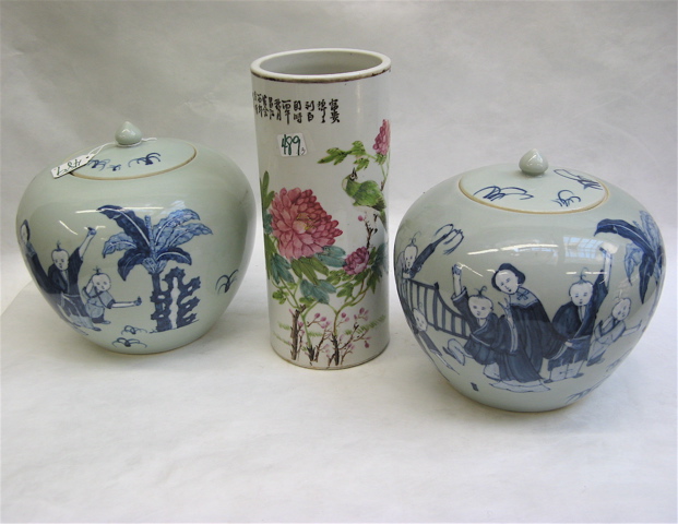 Appraisal: THREE CHINESE GLAZED POTTERY PIECES pair of covered jars decorated