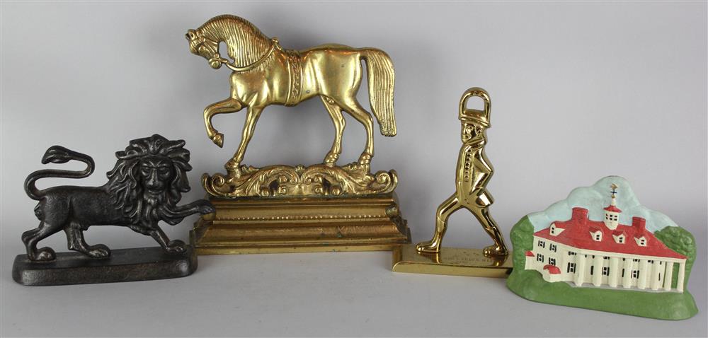 Appraisal: FOUR METAL DOORSTOPS one a brass prancing horse on a