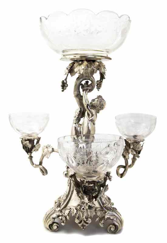 Appraisal: A Silverplate and Etched Glass Figural Epergne cast as a