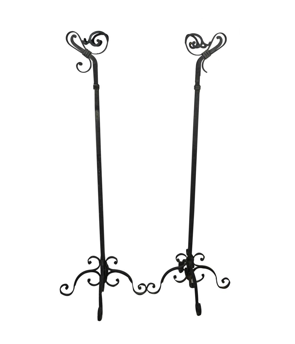 Appraisal: PAIR OF METAL GARDEN TORCHERESCondition with residue remaining on iron