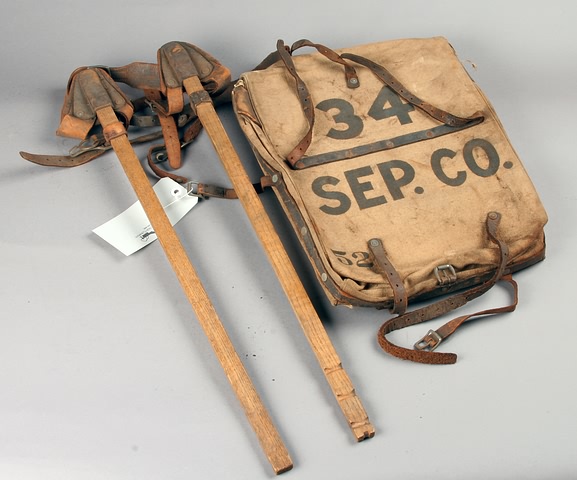 Appraisal: Merriam Pack with original wood poles and leather straps marked