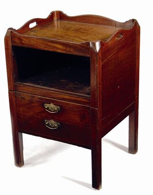 Appraisal: A mahogany 'tray top' bedside cupboard with pierced handgrips and