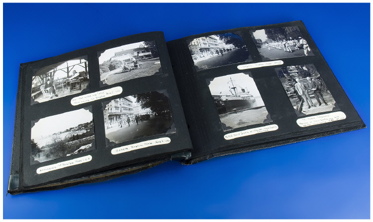 Appraisal: Photograph Album Containing Black And White Photos Mostly Relating To