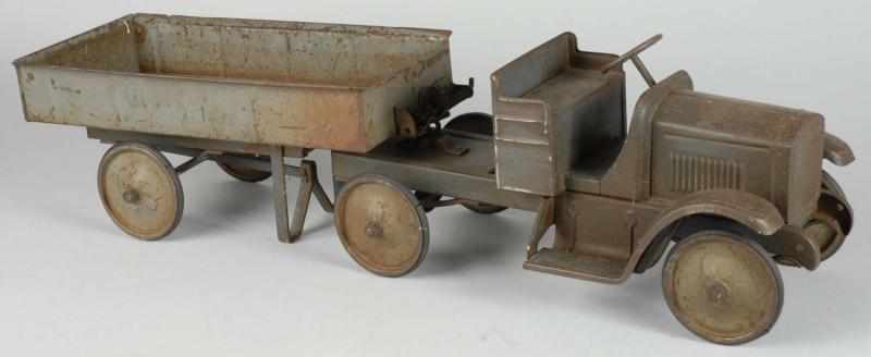 Appraisal: Pressed Steel Steelcraft Two Piece Dump Truck Description Original condition