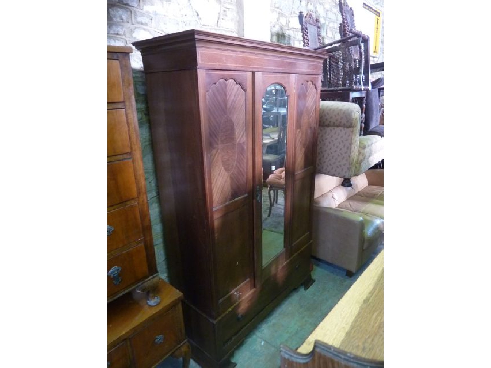 Appraisal: An Edwardian mahogany wardrobe with full length mirror panelled door