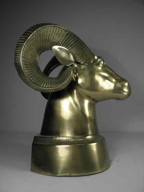 Appraisal: Polished gilt metal sculpture of a ram's head Two piece