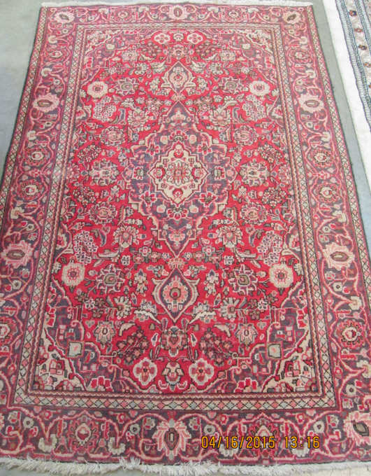 Appraisal: SEMI-ANTIQUE PERSIAN AREA RUG floral and central floral medallion design