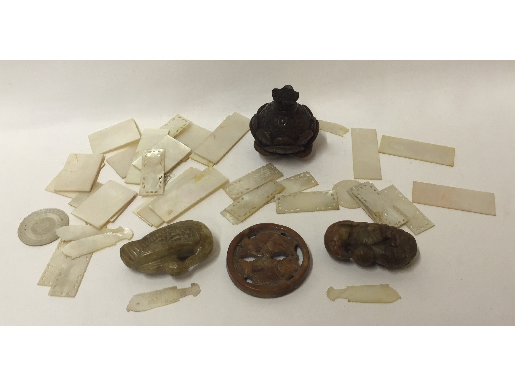 Appraisal: Four Chinese carved hardstone pieces and various mother of pearl