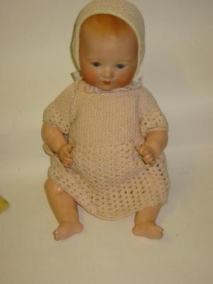 Appraisal: An Armand Marseille bisque head baby doll with blue glass