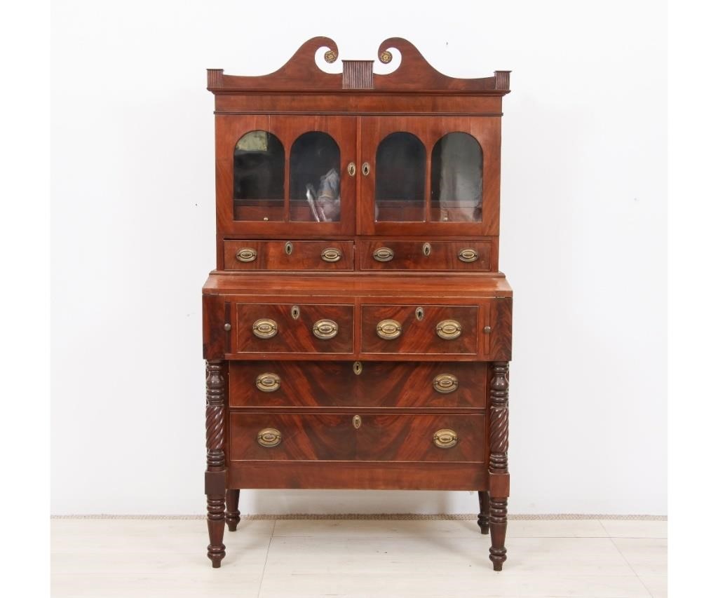 Appraisal: Sheraton mahogany two-part secretary bookcase th c with broken arch