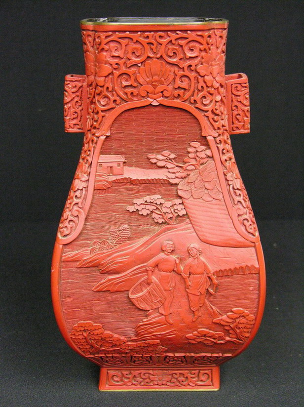 Appraisal: LARGE VINTAGE CINNABAR VASE scenic carvings some cracking to exterior