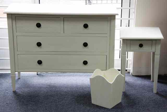 Appraisal: A white painted chest of two short and two long