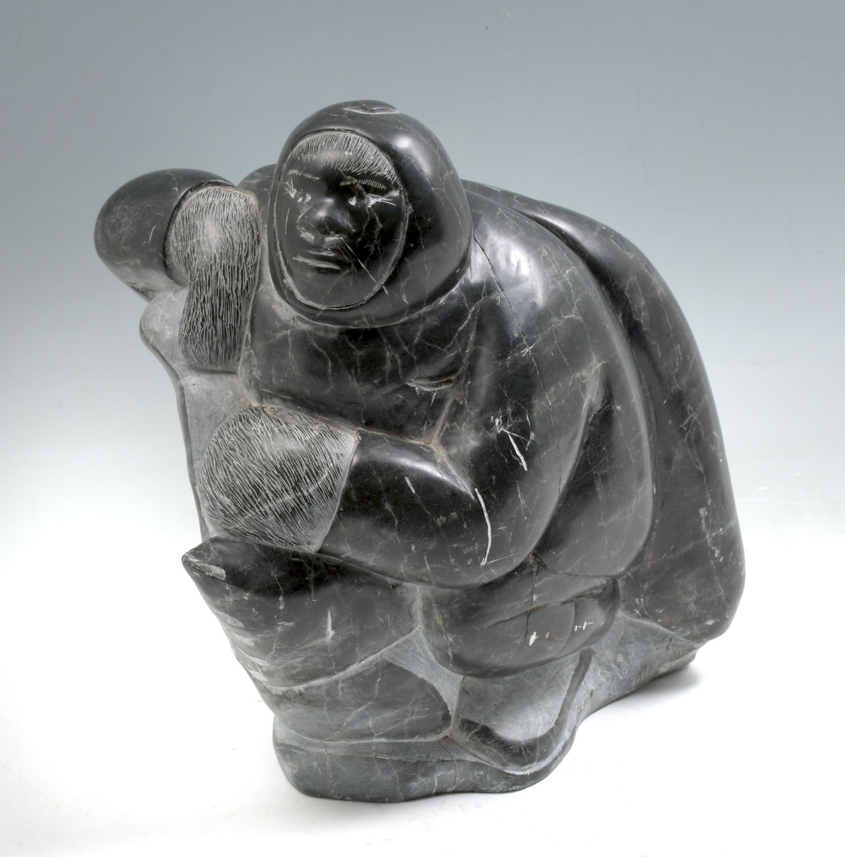 Appraisal: CARVED ESKIMO HUNTER INUIT SOAPSTONE SCULPTURE Approx '' in height