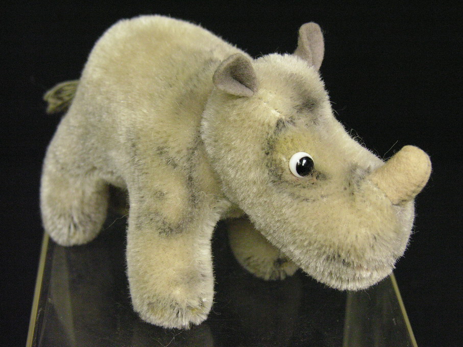 Appraisal: STEIFF RHINO Estate item This rhino is missing his ear