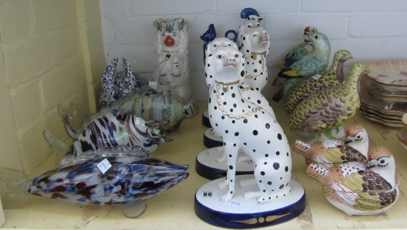 Appraisal: A quantity of modern pottery animals including four Staffordshire style