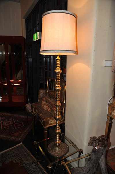 Appraisal: A CLASSICAL STYLE BRASS STANDARD LAMP WITH SHADE