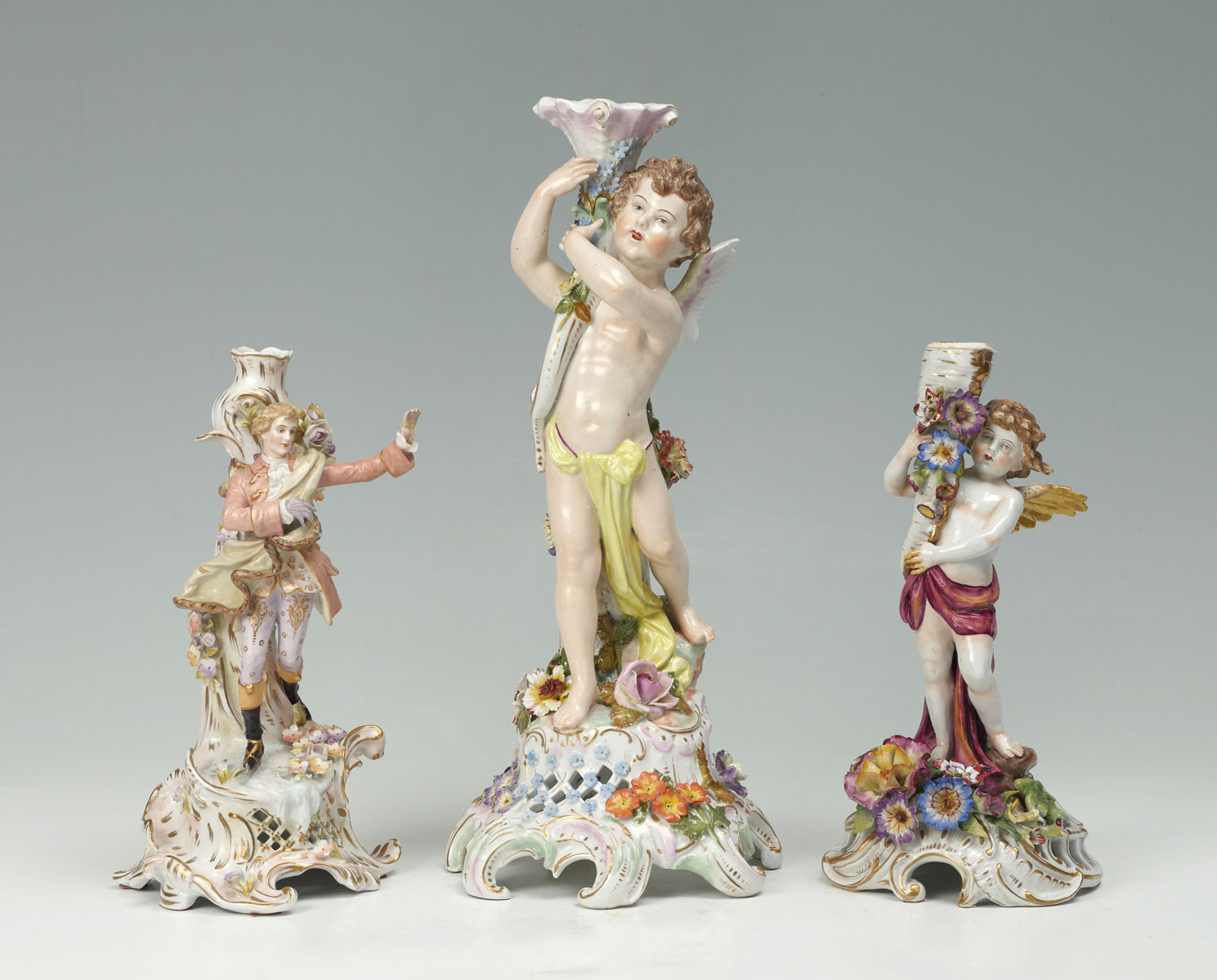 Appraisal: PIECE GERMAN FIGURAL PORCELAIN CANDLESTICKS Comprising - Large Dresden stamped