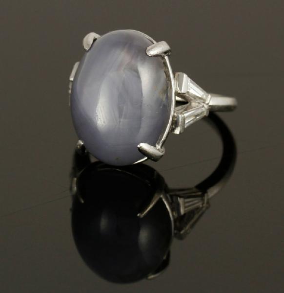 Appraisal: - Ladies' Platinum Blue Star Sapphire and Diamond Ring Ladies'