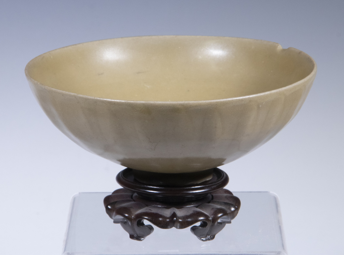 Appraisal: CHINESE FOOTED BOWL Qing Dynasty Teadust Glazed Bowl with outside