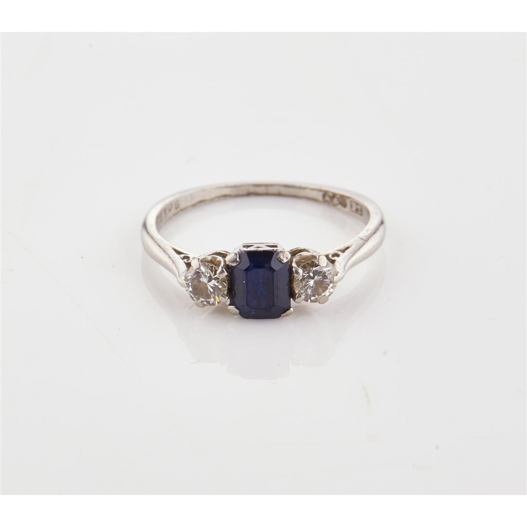 Appraisal: A sapphire and diamond three stone ring claw set with