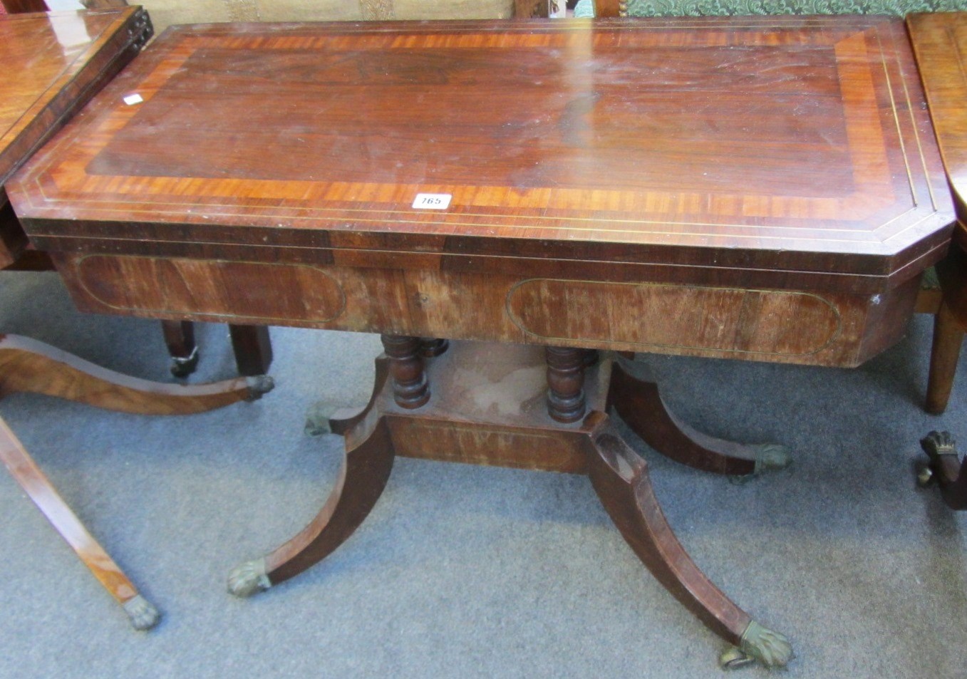 Appraisal: A Regency oak drum table with four true and four