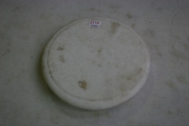 Appraisal: A small round white marble Chapati bowl on three legs