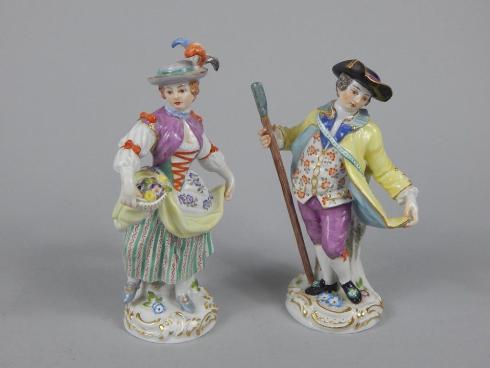 Appraisal: A near pair of Meissen style figures one in the