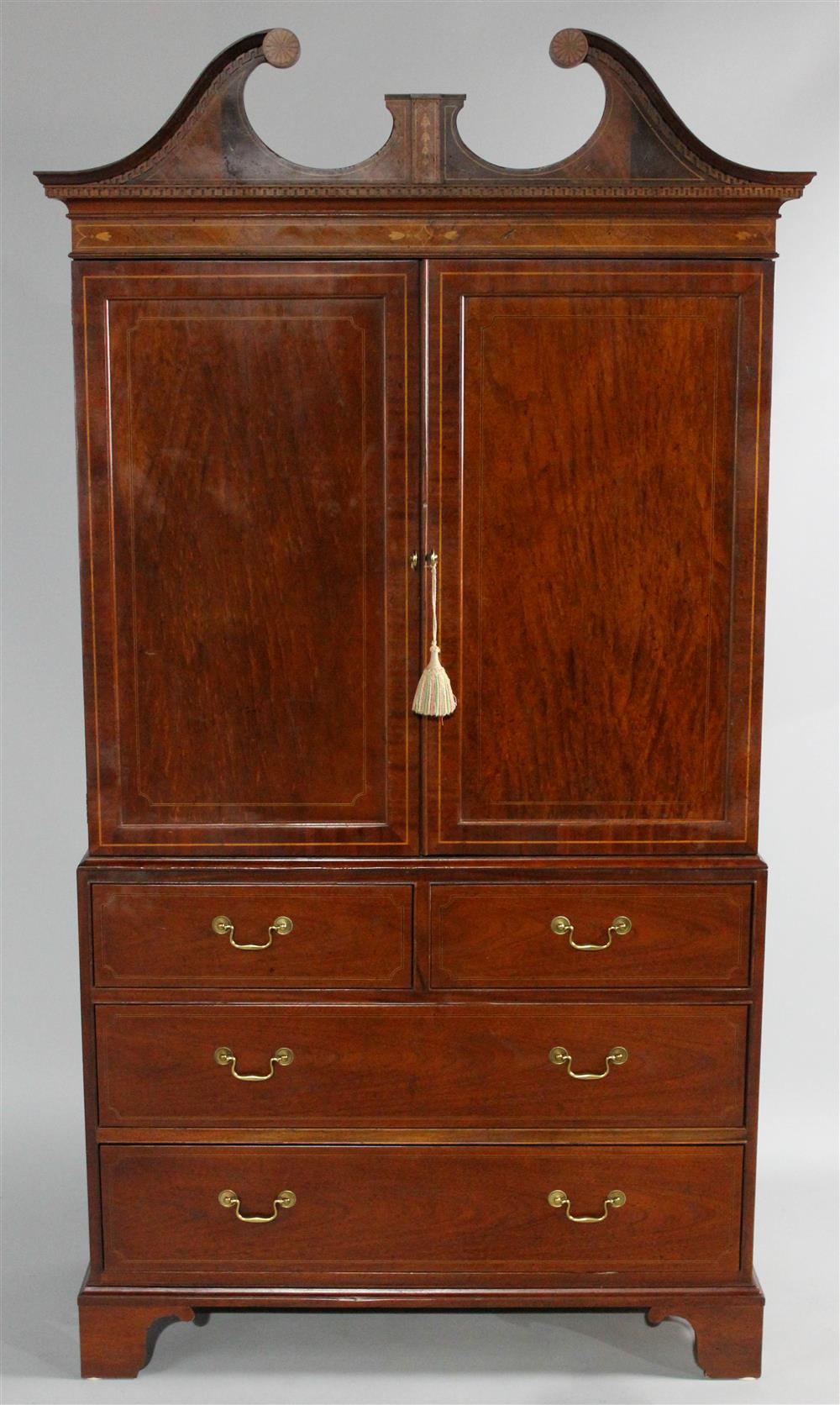 Appraisal: BAKER CHIPPENDALE STYLE MAHOGANY LINEN PRESS IN TWO PARTS split