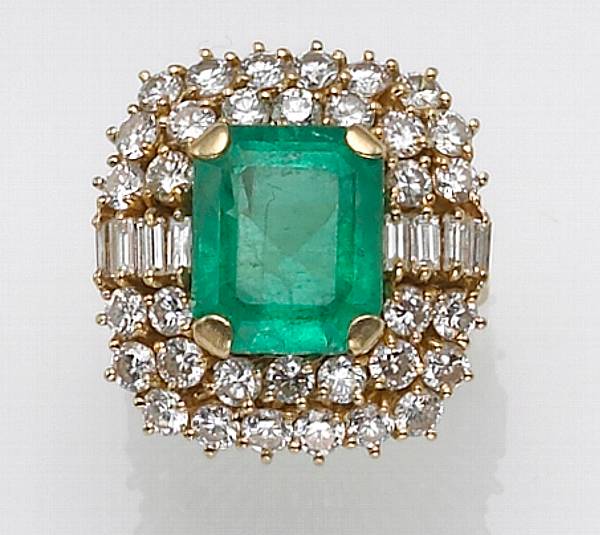 Appraisal: An emerald diamond and high karat gold ring centering an